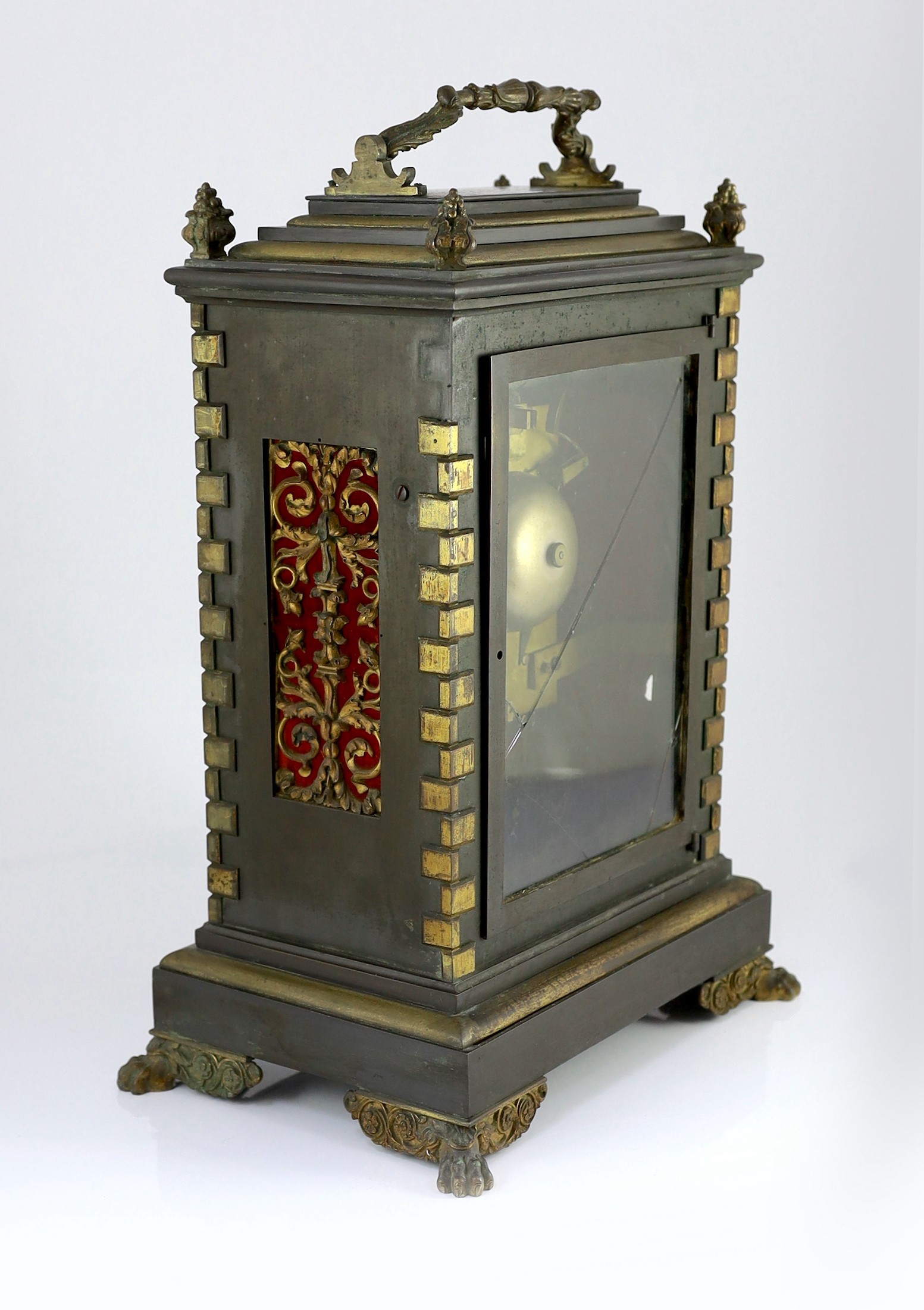 Feltham of Jersey. An early Victorian ormolu mounted ebonised bronze bracket clock, 34cm wide, 24cm deep, 52cm high